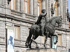 El Caballito, equestrian sculpture of King Charles IV of Spain by Manuel Tolsá on the back the Museo Nacional de Arte (National Museum of Art)
