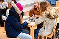 Image 12Young girls playing a board game in the Iisalmi library in Finland, 2016 (from Board game)