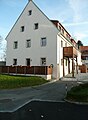 Wohnstallhaus und Scheune eines ehemaligen Dreiseithofes