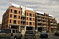 Windows being installed on the 500's on the Main project along West Main Street.