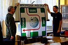 Kpjas (Krzysztof Jasiutowicz) on the left, father of the Polish Wikipedia and Saper (Marcin Cieślak) on the right, president of Internet Society Polska during first working session offline with banner of this meeting