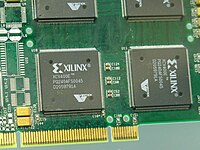 Photo d'une Xilinx FPGA XCV400E-PQ240