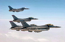 F-16s fly observation formation off the wing of a KC-10 409aeg-f16falcons.jpg