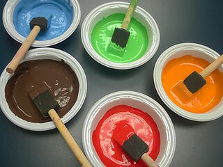 Paint Pigment applied over a surface that dries as a solid film