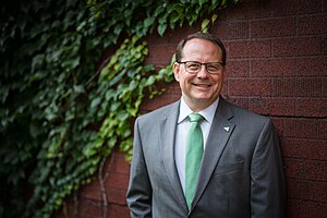 Headshot of Mike Schreiner, leader of the Green Party of Ontario and MPP for Guelph.