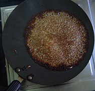 Methi dosa on a pan.jpg