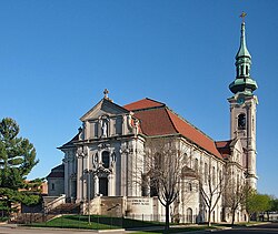 The Church of St. Agnes, which is prominently visible in the center of the neighborhood.