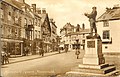 Punch house shown on the right of the Rolls Statue. The picture taken in 1910 also shows a plain wall where a window is now.