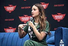 Carrero speaking with attendees at the 2023 Phoenix Fan Fusion at the Phoenix Convention Center in Phoenix, Arizona. Aimee Carrero (52954821288).jpg