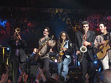 Billy Joel Band in 2007. Carl Fischer (left), Andy Cichon, David Rosenthal (background), Crystal Taliefero, Mark Rivera and Tommy Byrnes