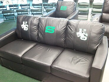 Couch in Graham Huskies Clubhouse players lounge