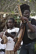 2016, Cameroon. Right, arched harp with modern tuners. Left, possible gúlúm or gurmi lute.