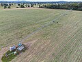 Irrigation sprinkler in farm field