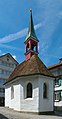 * Nomination Kreuzkapelle, Appenzell --Domob 12:33, 1 June 2021 (UTC) * Promotion Please correct the verticals. --Ermell 12:41, 1 June 2021 (UTC)  Comment Thanks for the review! I know the perspective is not 100% straightened, but if I do that, the top looks very unnatural. IMHO in the current form, the chapel looks natural (but also not leaning too much, as I did apply some perspective correction). Or are you asking for something else? --Domob 12:46, 1 June 2021 (UTC) You can orientate yourself by the building behind it --Ermell 21:27, 1 June 2021 (UTC)  Done I see what you mean, corrected the verticals of the buildings in the background. --Domob 04:53, 2 June 2021 (UTC) The upper part of the background fits. At the bottom, however, something has been added. There is a stitching error at the very left visible. --Ermell 08:39, 5 June 2021 (UTC)  Done Fixed the stitching error and perspective. --Domob 15:01, 7 June 2021 (UTC)  Support Good quality now. Thank you. --Ermell 19:51, 7 June 2021 (UTC)