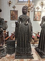 Bronze statue at her father's cenotaph, Innsbruck