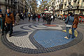 The mosaic "Pla de l'Os" by the artist on the Ramblas of Barcelona