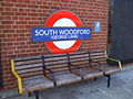 South Woodford tube station roundel, eastbound platform (note: "George Lane" suffix officially dropped in 1947)