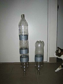 Two multi-bottle rockets with a cat for scale. Two Rockets.JPG