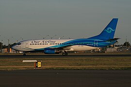 Our Airline (VH-INU) Boeing 737-3Y0 at Sydney Airport.jpg