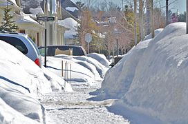 Sidewalk in Wasaga Beach, Ontario, Canada cleared after a snowfall