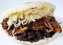 arepa, national dish of Venezuela Arepa de pabellon.jpg