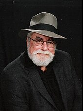 American writer Jim Marrs claimed that former Nazis and their sympathizers had been continuing Nazi policies worldwide, especially in the United States. Jim PR 2010.jpg