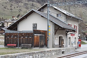 Three-story building with gabled roof