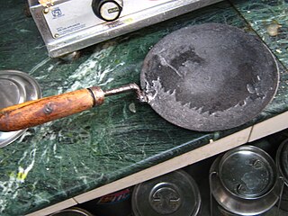 <span class="mw-page-title-main">Tava</span> Disc-shaped frying pan originating from the Indian subcontinent