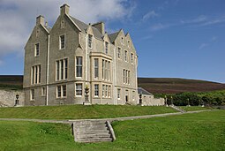 Trumland Hoose on Rousay, designed bi David Bryce wha an aa designed Balfour Castle on Shapinsay.