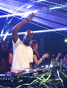 Black Coffee is a music producer and DJ who solely performs with his right hand due to a brachial plexus, injury resulting in paralysis of his left hand.