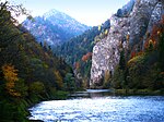 River gorge, surrounded by tree-covered mountains