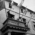 1944 - General Charles de Gaulle speaks to the people of Cherbourg from the balcony of the City Hall during his visit to the French port city