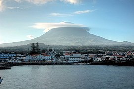 The village of Madalena at the western base of Mount Pico, as seen from the Faial-Pico Channel