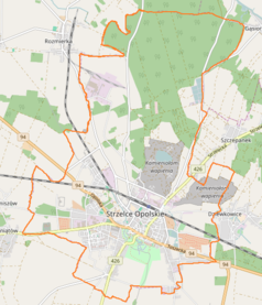 Mapa konturowa Strzelec Opolskich, blisko centrum u góry znajduje się punkt z opisem „Farska Kolonia”