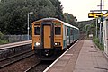 An Arriva Trains Wales Class 150 arrives with a service to Wrexham.