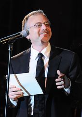 Carey wrote and produced "One Child" with Broadway composer Marc Shaiman. Marc Shaiman Crop.jpg