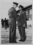 USAF photo of Major McGee receiving the Distinguished Flying Cross in Korea in 1951