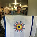 Randa Markos, a UFC fighter from Canada, holding the flag