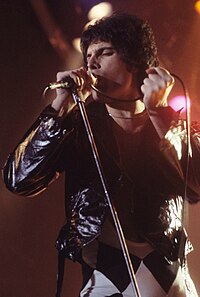 Freddie Mercury performing