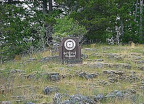 A small sign marking Octopus Provincial Park in the center of a clearing