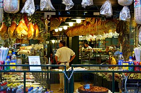 Foods and personnel at a salumeria Salumeria Gabbani.jpg