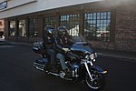 Thumbnail for File:Couple Returning on Blue &amp; Black Electra Glide - Las Vegas Ride for Kids 2019.jpg