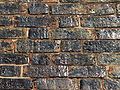 Old bricks with green glaze