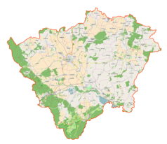 Mapa konturowa powiatu ząbkowickiego, blisko centrum na dole znajduje się punkt z opisem „Pilce”