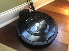 Roomba 805 on its charging dock Roomba 805 charging.jpg