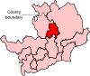 A small constituency, located in the north of the county and entirely surrounded by other constituencies within the county.