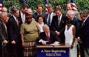 President Clinton signing the Personal Responsibility and Work Opportunity Reconciliation Act of 1996 into law. Welref.jpg