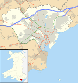 A large map of Cardiff, Wales with the location of the Senedd building in Cardiff Bay marked. In the bottom right corner is a wider map of Wales with Cardiff highlighted in the South.