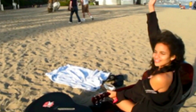 Shungudzo performing on a public beach in Malibu, California GovereBeach.png