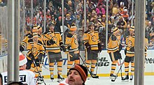 Several Boston Bruins wearing their 2010 Winter Classic jerseys. Bruins Warmup (4242247564).jpg